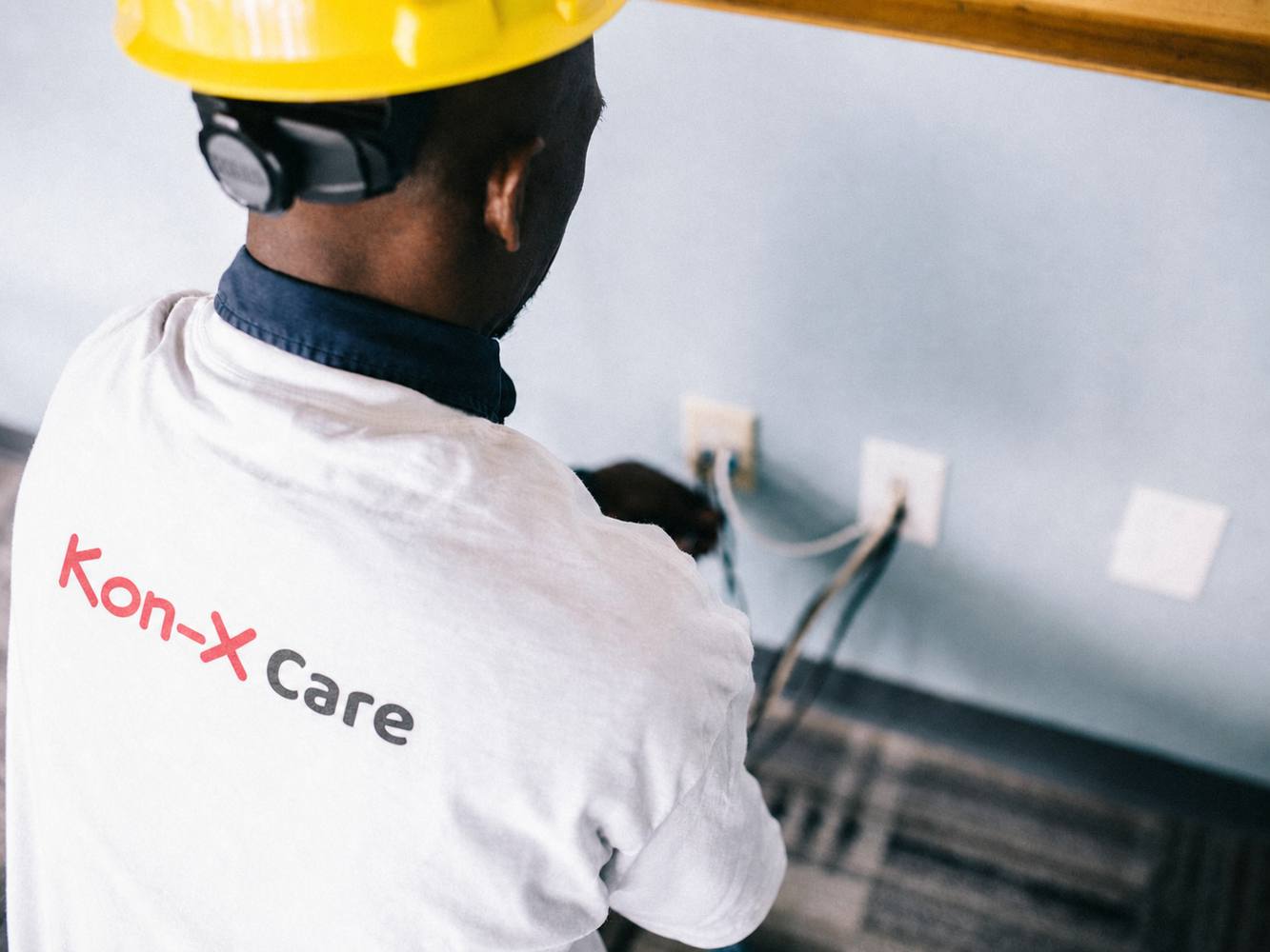 Kon‑X Care technician installing sockets